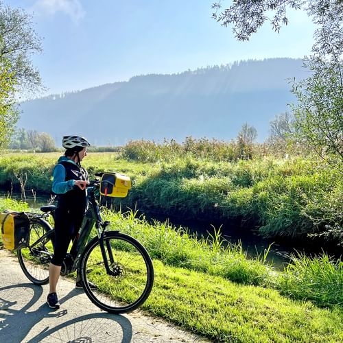 Cyclist on cycle path along the Glan